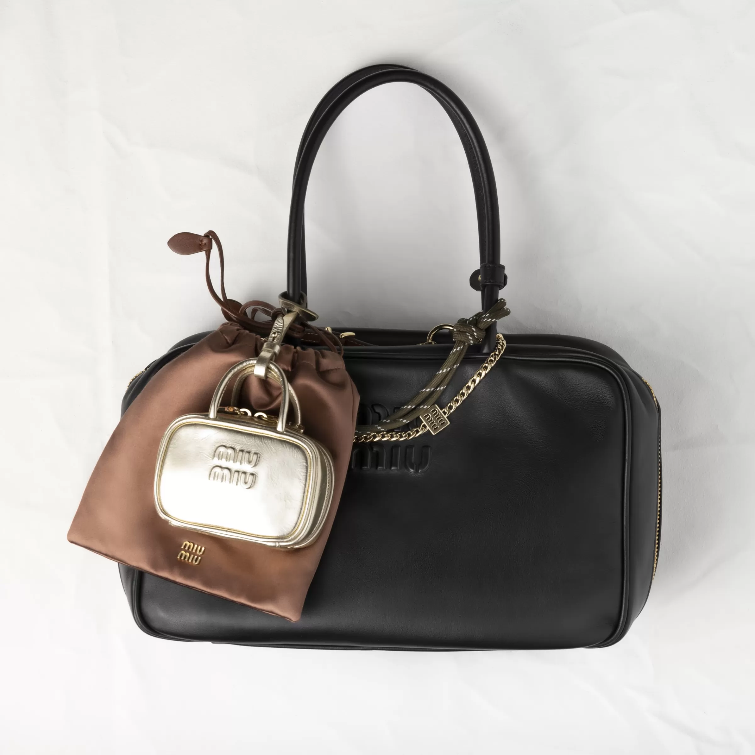 Beau laminated leather micro bag>Miu Miu Flash Sale