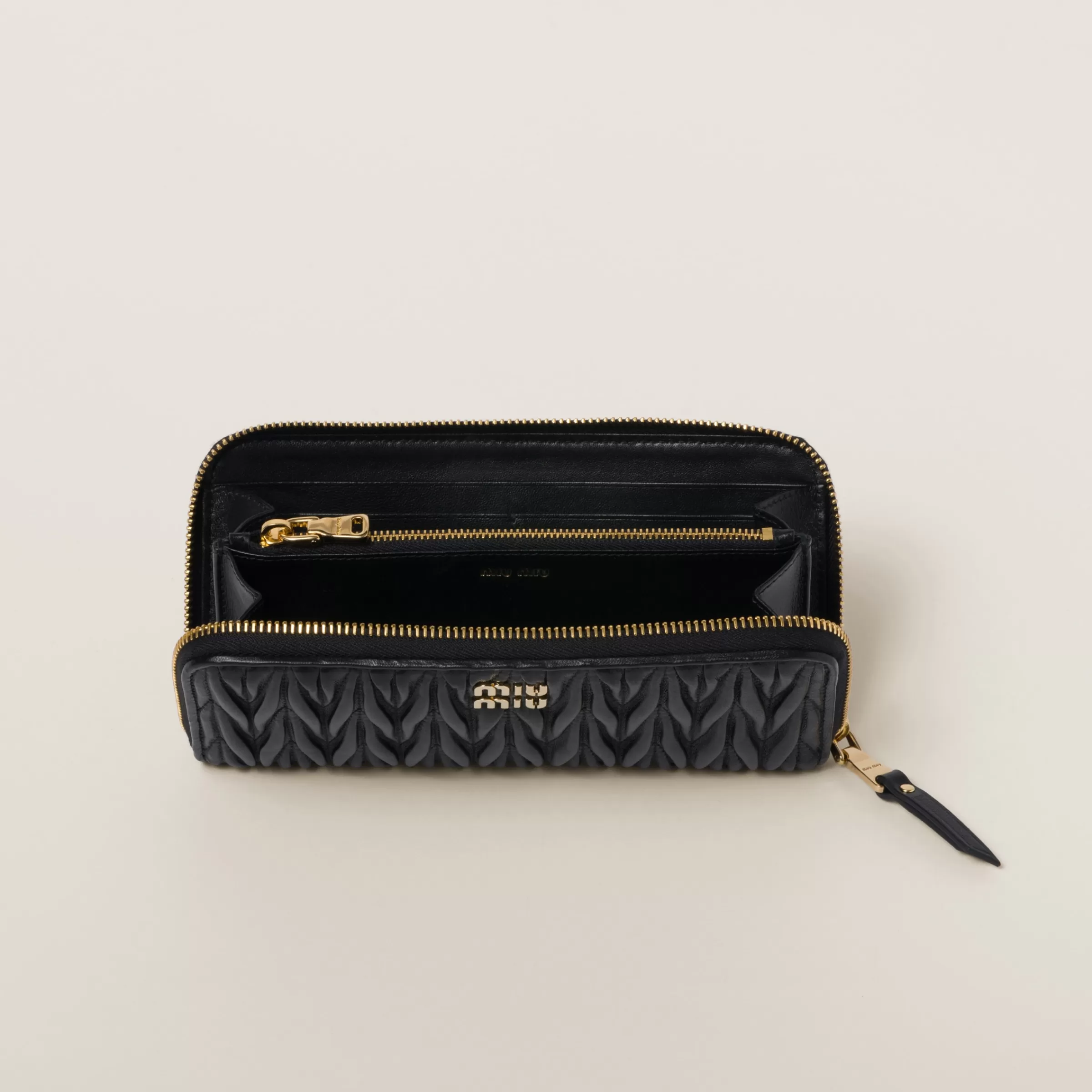 Large matelassé nappa leather wallet>Miu Miu Outlet