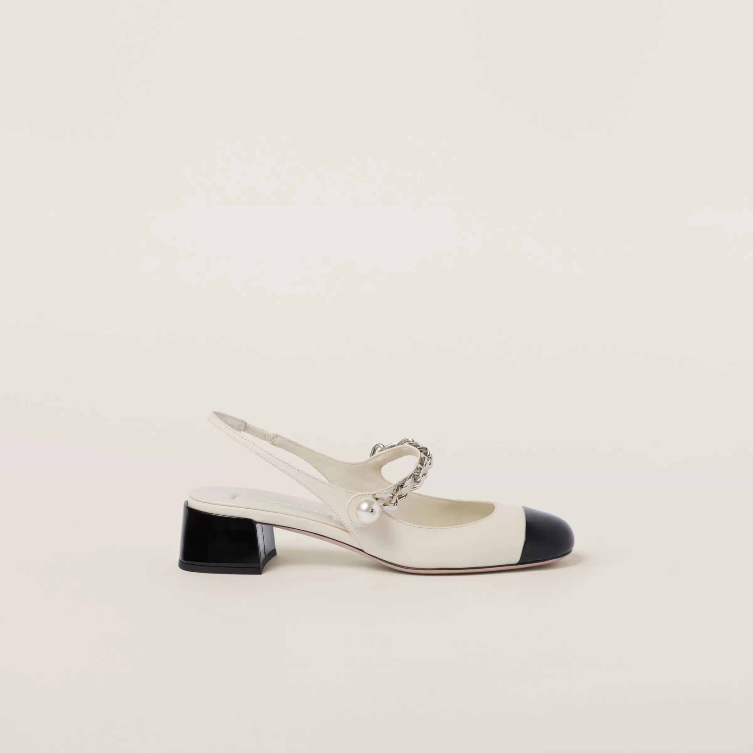 Leather and patent leather slingback pumps>Miu Miu Cheap