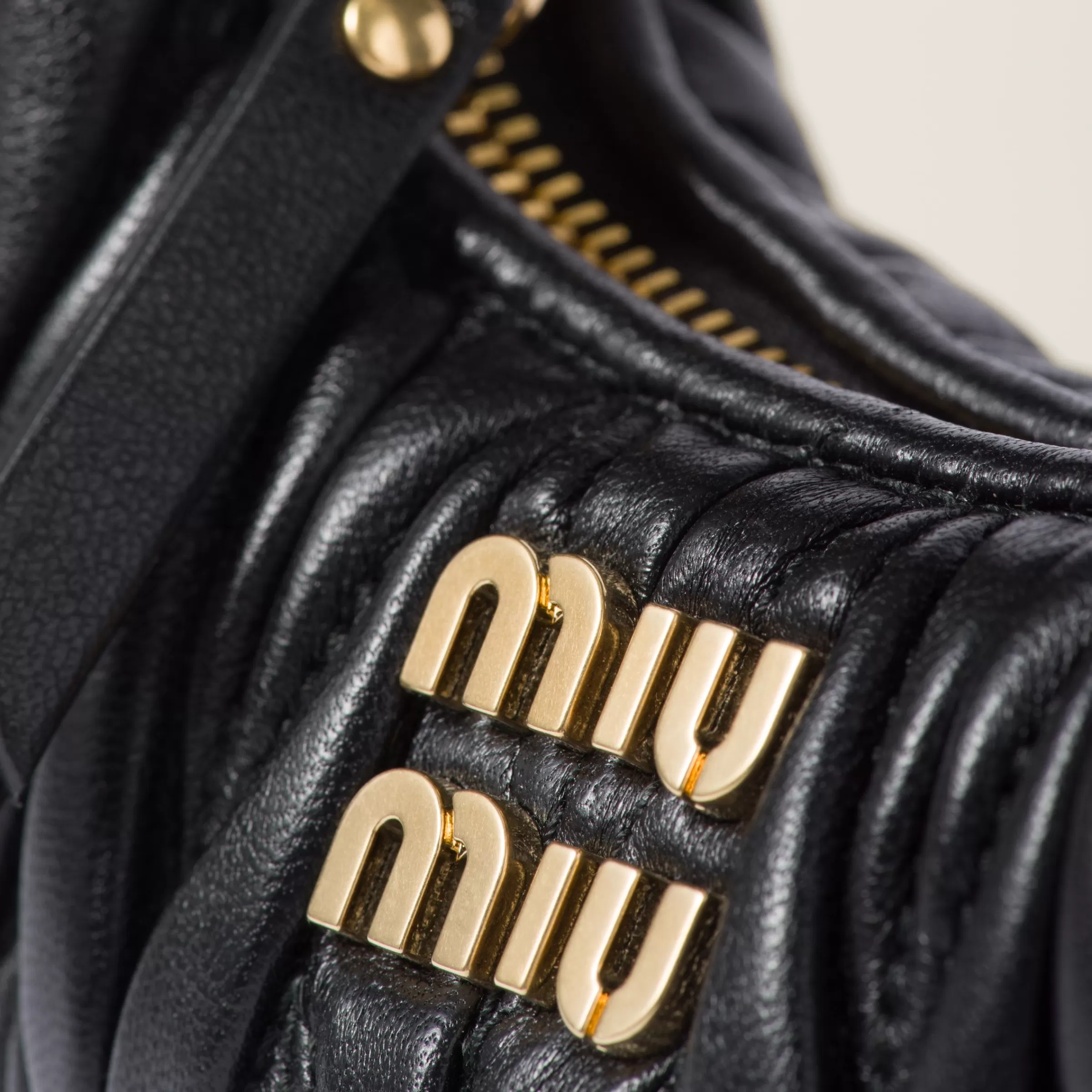 Wander matelassé nappa leather micro hobo bag>Miu Miu Cheap